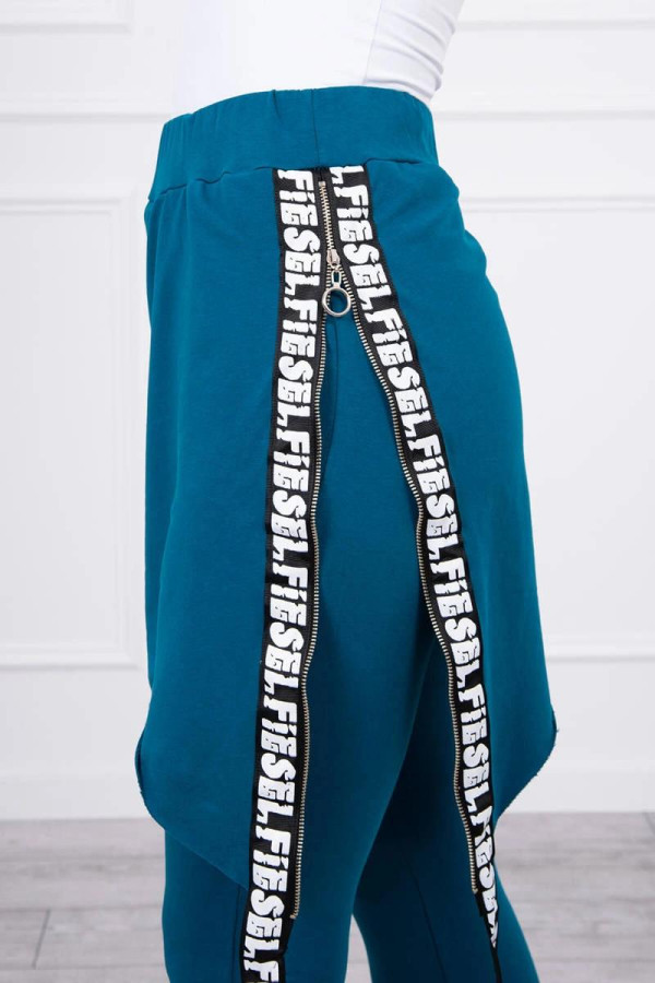 Kalhoty à la overal s ramínkem s nápisem Self tmavé tyrkysové